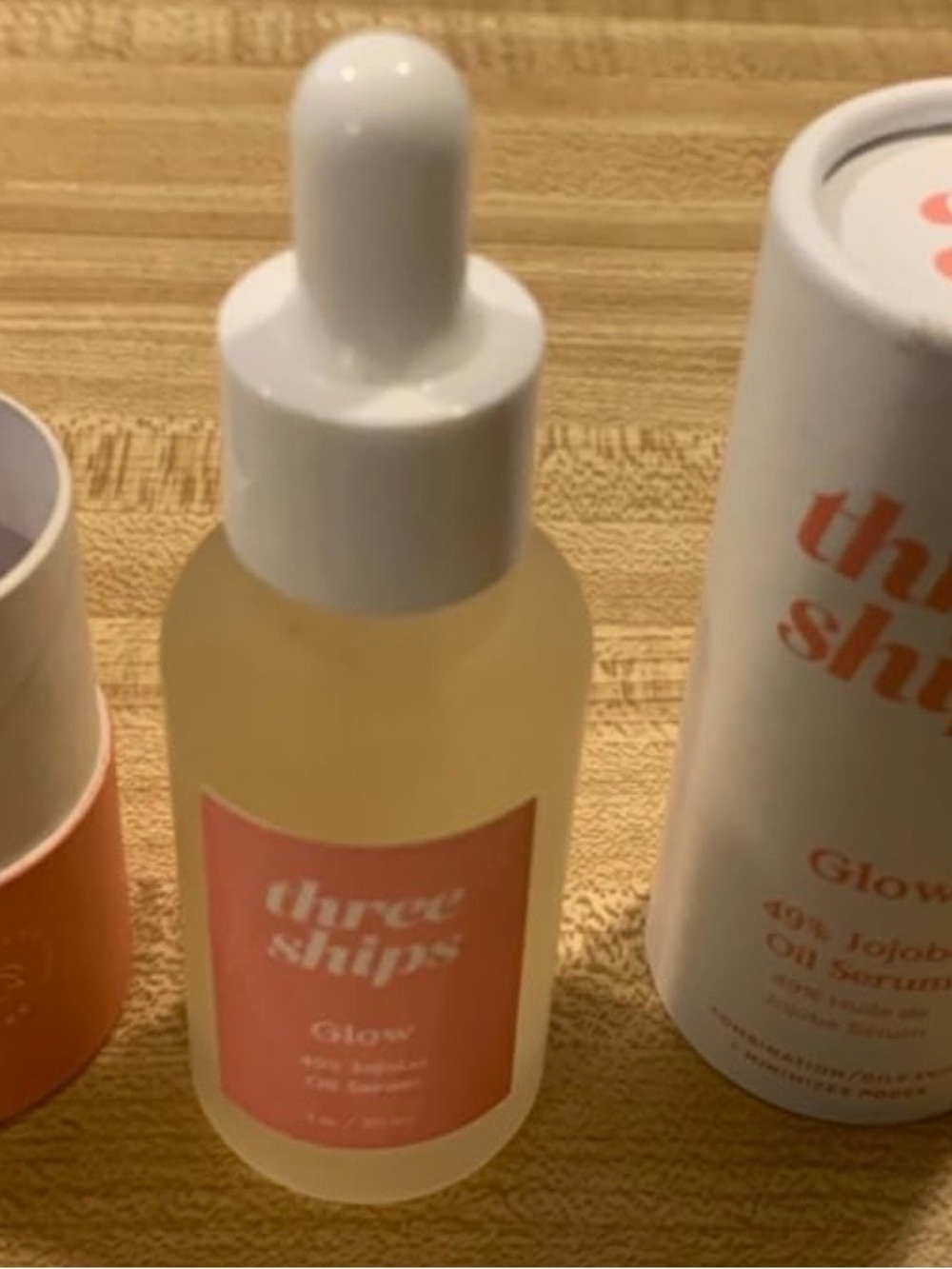 Thrive Glow Jojoba Serum in Coral Pink Dropper Bottle